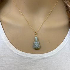 Description: Small 14k Solid Gold Guanyin Kwan Yin Female Buddha Jade Pendant - (Chain Is Not Included) Item No.: P449/2331 Metal Type: 14k Solid Gold Metal Color: Yellow Gold. Stones: Natural Jade Measurement: Pendant: 35 X 16 Mm. Jade: 26 X 16 X 6 Mm. Est. Total Weight: 4.49 Grams Brand New Note: Chain Is Not Included. Available In Another Listing. Female Buddha, Shine Jewelry, Kwan Yin, Dog Pendant, Round Pendant Necklace, Gold Engraving, Gold Eyes, Medallion Necklace, Cz Pendant