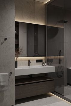 a bathroom with a sink, mirror and bathtub next to each other in it