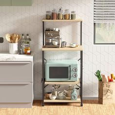 a kitchen area with a microwave, counter top and shelves on the wall above it