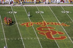 an aerial view of a football field with the team on it