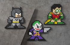 three perler beads depicting the characters of batman, joker, and person from the animated television series