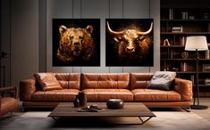 two paintings of bulls are hanging on the wall in a living room with leather couches