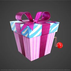 a pink and blue gift box with a purple bow