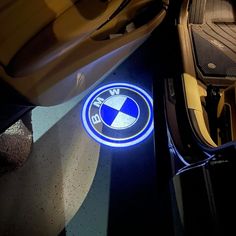 the bmw logo is glowing on the floor