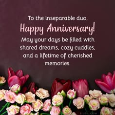 flowers are arranged in front of a purple background with the words to the insepable duo happy anniversary may your days be filled with shared dreams, cozy cuddles, and a