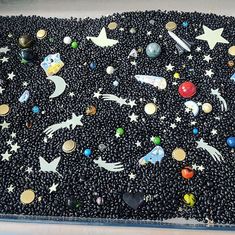 there is a cake made to look like outer space