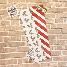 a brick wall with christmas wrapping on it