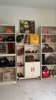 a room filled with lots of shoes and handbags