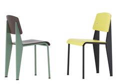 two different colored chairs sitting next to each other on a white background, one in black and the other in yellow