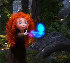 a red haired girl in a black dress is holding a blue light up wand while standing in the woods