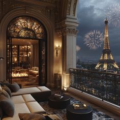 a living room with a view of the eiffel tower and fireworks in the sky