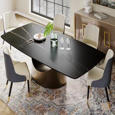 a dining room table with chairs around it