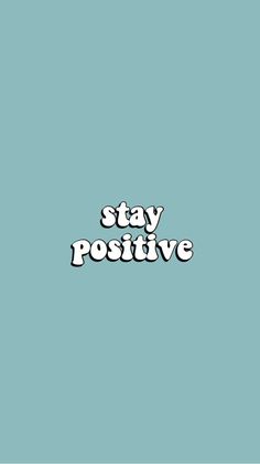 the words stay positive written in white on a blue background with black and white lettering