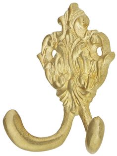 an ornate gold door handle on a white background