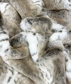 Fur throws in our Beige Lynx design are proving to be one of our best sellers ever. Probably because of the beautiful combination of off-white, beige and taupe, or maybe its because of the striped pattern to the design. But whatever it is, this fur throw is being bought for bed, sofa or chair; for decoration or for snuggling under on cold nights; for a fur throw or as a full faux-fur bedspread. We can obviously see the appeal. It has a warm, soft dense fur and is one of the more subtle designs o Fur Bedspread, Fur Bed Throw, Fur Bed, Wooden Door Stops, Faux Fur Bedding, Fur Bedding, Faux Fur Blanket, Animal Fur, Bed Throw