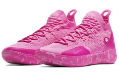 This season, show your support for breast cancer awareness with the Nike Zoom KD 11 'Aunt Pearl' sneakers. Kevin Durant has made raising awareness of women's cancers a priority since his beloved Aunt Pearl passed away from breast cancer, and the tradition continued in 2019 when Nike partnered with the Kay Yow Cancer Fund to create these special edition sneakers. The names of 59 breast cancer survivors are printed on the insole and heel counter, and the Flyknit upper is in pink—the color signifyi Kd Basketball Shoes, Pink Basketball Shoes, Best Volleyball Shoes, Girls Basketball Shoes, Kd Shoes, Best Basketball Shoes, Jordans Girls, Nike Elite Socks, Shoes Sneakers Jordans