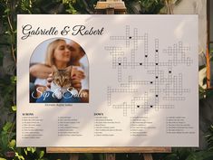 a crossword puzzle board with a cat on it's front and back cover