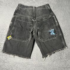 Vintage Jnco Jeans Mens 31x12 Black Y2k Baggy Skater Grunge Hip Hop Denim Jorts Good Condition - No Holes, One Small Mark On The Back. Was Originally Jeans And Made Into Shorts Waist Measurement (Inches): 31 Inseam (Inches): 12 Included Pictures Of All Flaws And Signs Of Wear That I Could Spot To The Best Of My Ability. Do Not Hesitate To Message Me About More Details Regarding Condition, Sizing, Etc. Refer To Measurements To Ensure Best Fit As Used Pieces Or Certain Brands May Not Fit Traditional Sizing. Returns Allowed Within 30 Days Of Purchase But Buyer Must Pay For Return Shipping. Y2k Cutoff Jeans For Streetwear, Y2k Style Cutoff Cotton Jeans, Y2k Cotton Cutoff Jeans, Y2k Style Cotton Cutoff Jeans, Black Cutoff Bottoms For Streetwear, Y2k Streetwear Cutoff Bottoms, 90s Style High Rise Bottoms For Streetwear, 90s Style Dark Wash Bottoms For Streetwear, Washed Black Y2k Cotton Bottoms