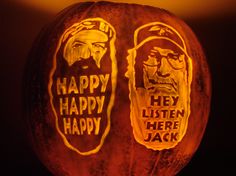 two faces carved into a pumpkin with the words happy, happy, and hey written on it