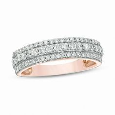 This 1/2 ct. t.w. diamond multi-row anniversary band is fashioned in 10K rose gold. Wide Diamond Wedding Bands, Anniversary Bands For Her, Eternity Band Stack, Gold Band Wedding Ring, Stacked Diamond Bands, Anniversary Rings For Her, Peoples Jewellers, Wedding Rings Rose Gold, Diamond Anniversary Rings