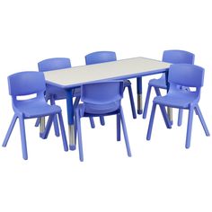 a white table with blue chairs around it