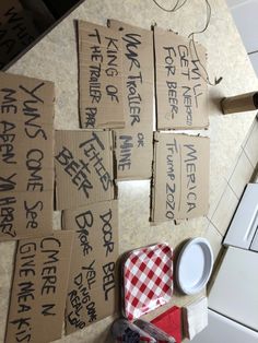 several pieces of cardboard with writing on them