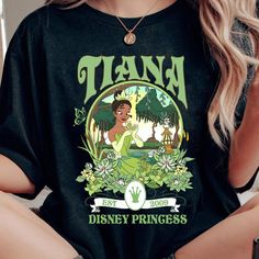 Retro Tiana Est 2009 Disney Princess Floral Shirt 1 Tiana Disneyland, Outfit With T Shirt, Princess Tiana Disney, Disney Birthday Shirts, Disney 2025, Tiana Disney, Disney Birthday Shirt, 2025 Ideas, Disney Princess Shirts