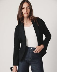 A blazer is a must. And in our premium ponte fabric, equipped with 4-way stretch, this piece is even more timeless (and comfortable). A traditional lapel and darting at the back are the definition of easy tailoring for a crisp, put-together look. A perfectly versatile piece, it can be seamlessly paired with any of our SPANXsmooth™ PerfectFit Ponte pants or your favorite pair of jeans. | Spanx Women's Ponte Blazer Top Blazer Top, Ponte Fabric, Ponte Pants, Style Board, Classic Black, Coats Jackets, Blazer, My Style, Clothes For Women