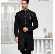 This is a premium sherwani Indo Western  by Golden Attire crafted from high quality fabric and imported materials. Our products are handcrafted by experienced tailors who make sure the that the stitching is precise, lining is proper and the overall product is sturdy enough to not go out of shape for more than a few years. Also all our products have extra margins in their length, sleeves, sides so it's easily alterable if your size changes after some time. To see more available colours and design Formal Black Sherwani With Dabka Work, Wedding Sherwani For Diwali Party, Black Traditional Wear For Groom On Eid, Black Sherwani For Party, Formal Party Wear Sherwani For Eid, Formal Party Wear Sherwani With Dabka, Festive Party Wear Sherwani For Groom, Wedding And Eid Party Wear Sherwani, Black Traditional Wear For Groom On Diwali