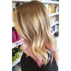 Soft blonde balayage with a peekaboo of pastel pink Light Pink Underneath Hair Blonde, Blonde Hair With Color Peekaboos Pink, Blonde Hair With Pastel Peekaboos, Blonde With Light Pink Peekaboo, Pastel Pink Money Piece Hair, Auburn Hair Balayage, Red Violet Hair