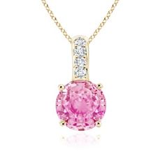 The stunning pink sapphire is enhanced by white diamonds that adorn the bale. Designed in a timeless pattern, this round pink sapphire pendant in 14k yellow gold is simple yet captivating. Pink Sapphire Pendant, Sapphire Pendant, White Diamonds, Pink Sapphire, 18k Rose Gold, Diamond White, Sapphire, Diamonds, Yellow Gold