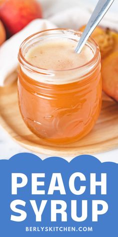 a jar of peach syrup on a plate with apples in the background and text overlay reads peach syrup