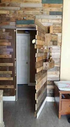 a room with wood planks on the walls