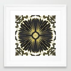 a black and yellow art print with an ornate design in the center, on a white wall