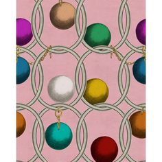 a pink background with many different colored balls and circles on the same fabric, as well as an ornament