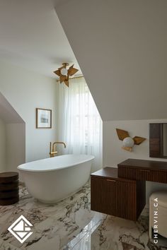 A serene master ensuite with a large soaker tub and richly stained wood makeup vanity desk. Dreamy Makeup, Master Ensuite, Vanity Desk, Custom Cabinetry, Makeup Vanity, Luxury Interior Design