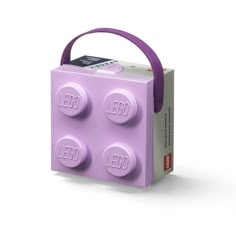 a purple lego bag is shown with four bricks in the front and two on the back