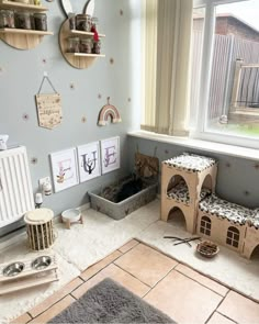 a child's room with toys and decor on the walls