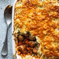 Photograph of Cumberland sausage pie in a serving dish with a portion of pie removed and a large spoon placed on the side of the dish Sausage Pie Recipe, Hairy Bikers Recipes, British Pie, Sausage Pie, Cumberland Sausage, Sausage Casserole Recipes, Sausage And Mash, Best Sausage, Potato Toppings