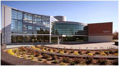 the outside of a large building with many windows