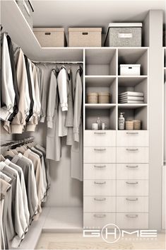 a white closet filled with lots of clothes