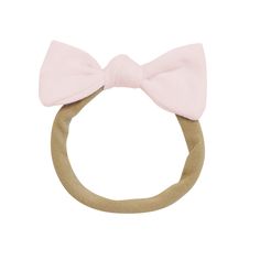 Add a touch of sweetness to your little one’s look with this easy-to-wear, knotted bow that keeps them feeling comfortable and looking cute. A soft, stretchy band made from nylon is super gentle on baby-fine hair and stays in place, no matter how much your little one crawls, rolls, or runs throughout the day. Nylon band 2.5” knotted bow Hockey Halloween, Womens Matching Sets, Sock Shop, Bamboo Fabric, Pet Bandana, Baby Bows, Burp Cloths, Baby Bag, Carseat Cover