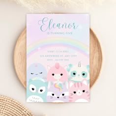 a birthday party card with cats and rainbows on the front, in pastel colors