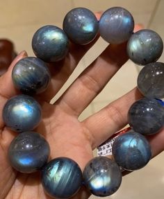 Material:Labradorite beads size :Approx 20mm   quantity: one strand  6mm approx 29 pcs one strands 7mm approx25 pcs one strands 8mm approx 22 pcs one strands 9mm approx 21pcs one strands 10mm approx 19 pcs one strands 11mm approx 18pcs one strands 12mm approx 16 pcs one strands 13mm approx 16 pcs one strands 14mm approx 15 pcs one strands 15mm approx 14pcs one strands 16mm approx 14 pcs one strands 17mm approx 13pcs one strands 18mm approx 13pcs one strands 19mm approx 12pcs one strands 20mm app Labradorite Round Bracelet Gift, Labradorite Beaded Jewelry As A Gift, Labradorite Bracelets With Natural Stones, Round Moonstone Beaded Bracelets As Gift, Gift Labradorite Jewelry With Polished Beads, Labradorite Beaded Bracelets With Round Beads, Round Labradorite Gemstone Beads Bracelet, Blue Labradorite Bracelets With Round Beads, Labradorite Round Beads For Jewelry Making