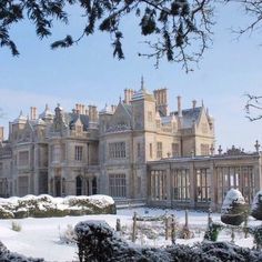 a large building with snow on the ground