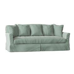 an image of a couch with pillows on the top and bottom layer in grey color