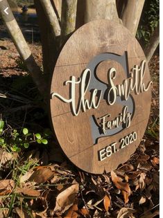 a wooden sign that says the smith family