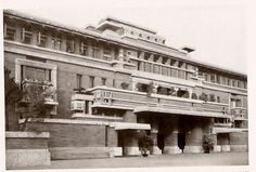 an old black and white photo of a building