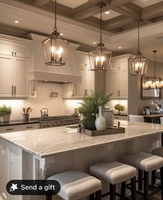 a kitchen with an island and four stools in front of the countertop area