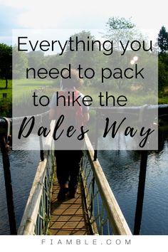 a person walking across a bridge with the words everything you need to pack to hike the wales way